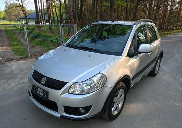 Suzuki SX4 cena 26990 przebieg: 170000, rok produkcji 2009 z Stepnica małe 379